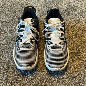 Black and White Lebron Witness VII. Men’s size 10.5.  Good condition